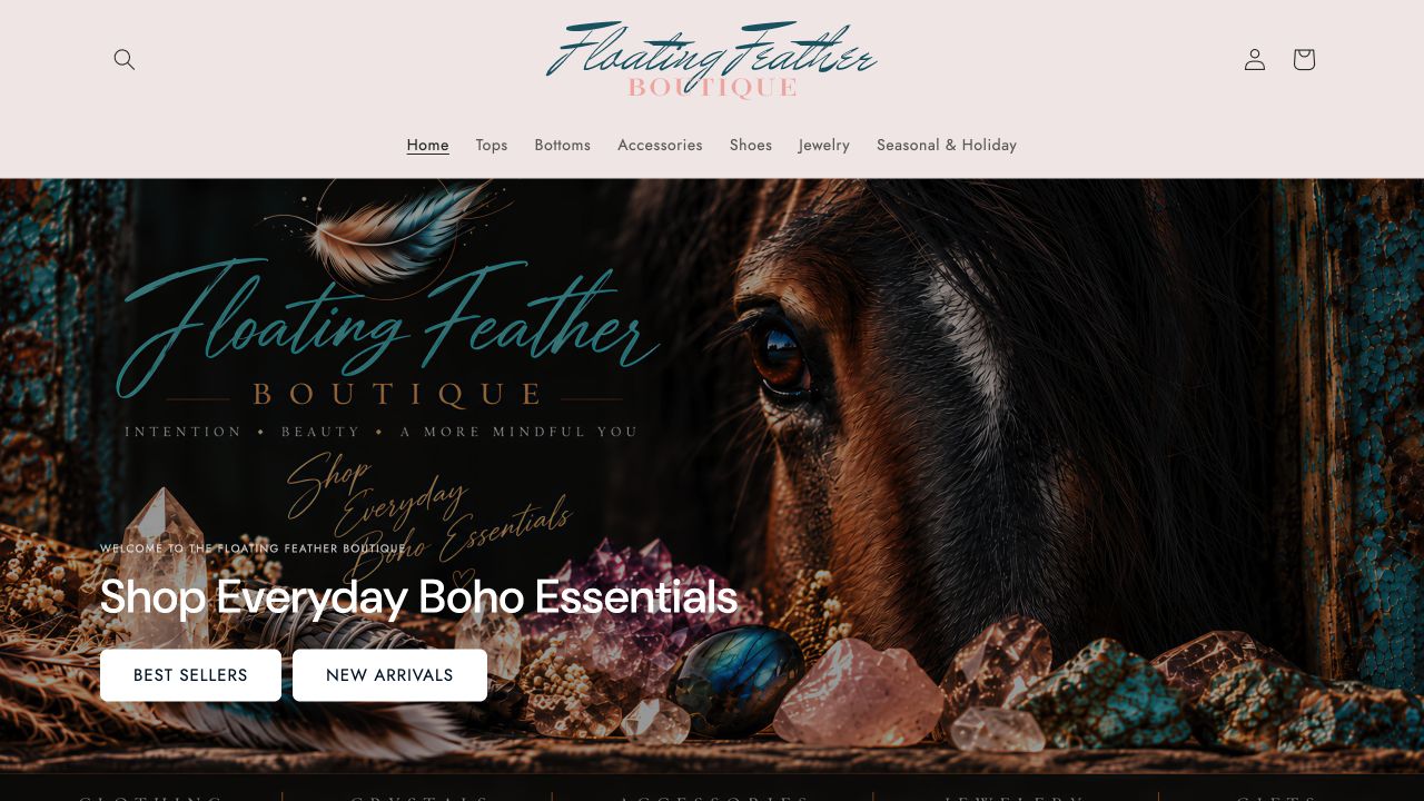 The Floating Feather Boutique homepage, with boho styling, boutique branding and shopping navigation